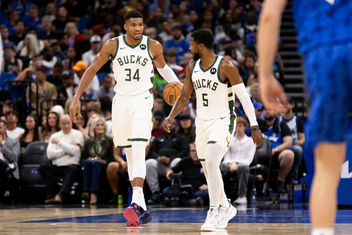 Milwaukee Bucks forward Giannis Antetokounmpo (34) talks with Milwaukee Bucks guard Malik Beasley (5) 